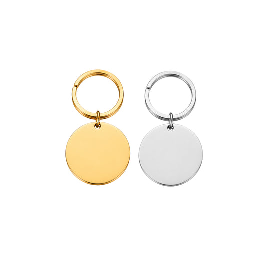Round stainless steel keychain in gold and silver, personalized with engraving
