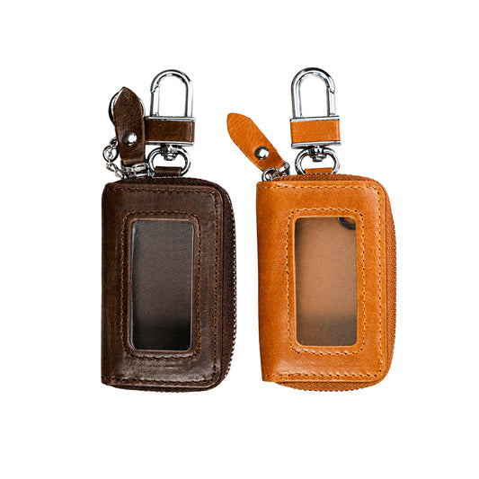 Premium leather car key case in brown and dark brown, personalized with engraving