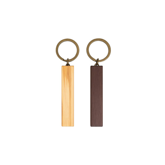 Slim wooden bar keychain in walnut and olive, personalized with engraving