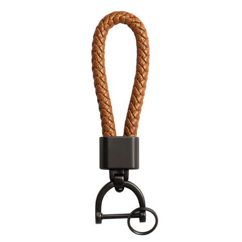 Brown braided leather keychain with black metal clip on a white background