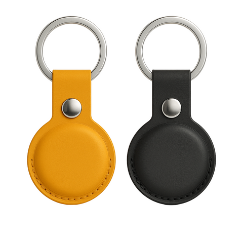Two keychains, one yellow and one black, on a white background