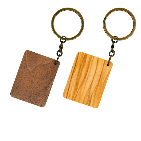 Two wooden keychains with metal rings on a white background
