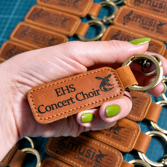Bulk leather keychains engraved with a company logo, 10 piece minimum