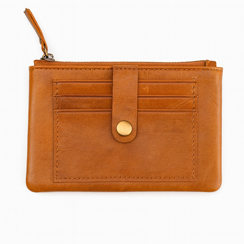 Brown leather wallet with a gold button on a white background