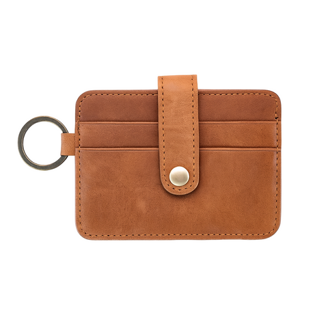 Brown leather key fob with a key ring on a white background