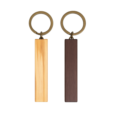 Two wooden keychains with metal rings on a white background